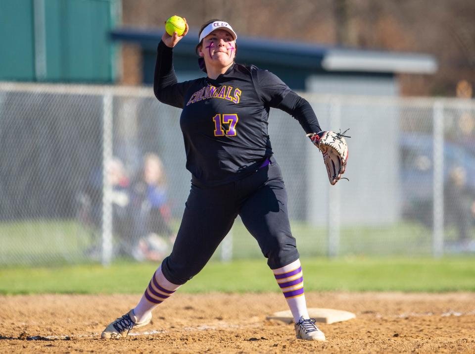 Clay's Haylee Hyduk throws to first during the Clay vs. Saint Joseph softball game at Clay High School.