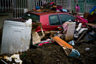 <p>Items destroyed by flooding from Hurricane Maria sit in the street, waiting to be picked up by the garbage service, in Toa Baja, Puerto Rico, Monday, Oct. 16, 2017. With hundreds of thousands of people still without running water, and 20 of the islandâs 51 sewage treatment plants out of service, there are growing concerns about contamination and disease. (Photo: Ramon Espinosa/AP) </p>