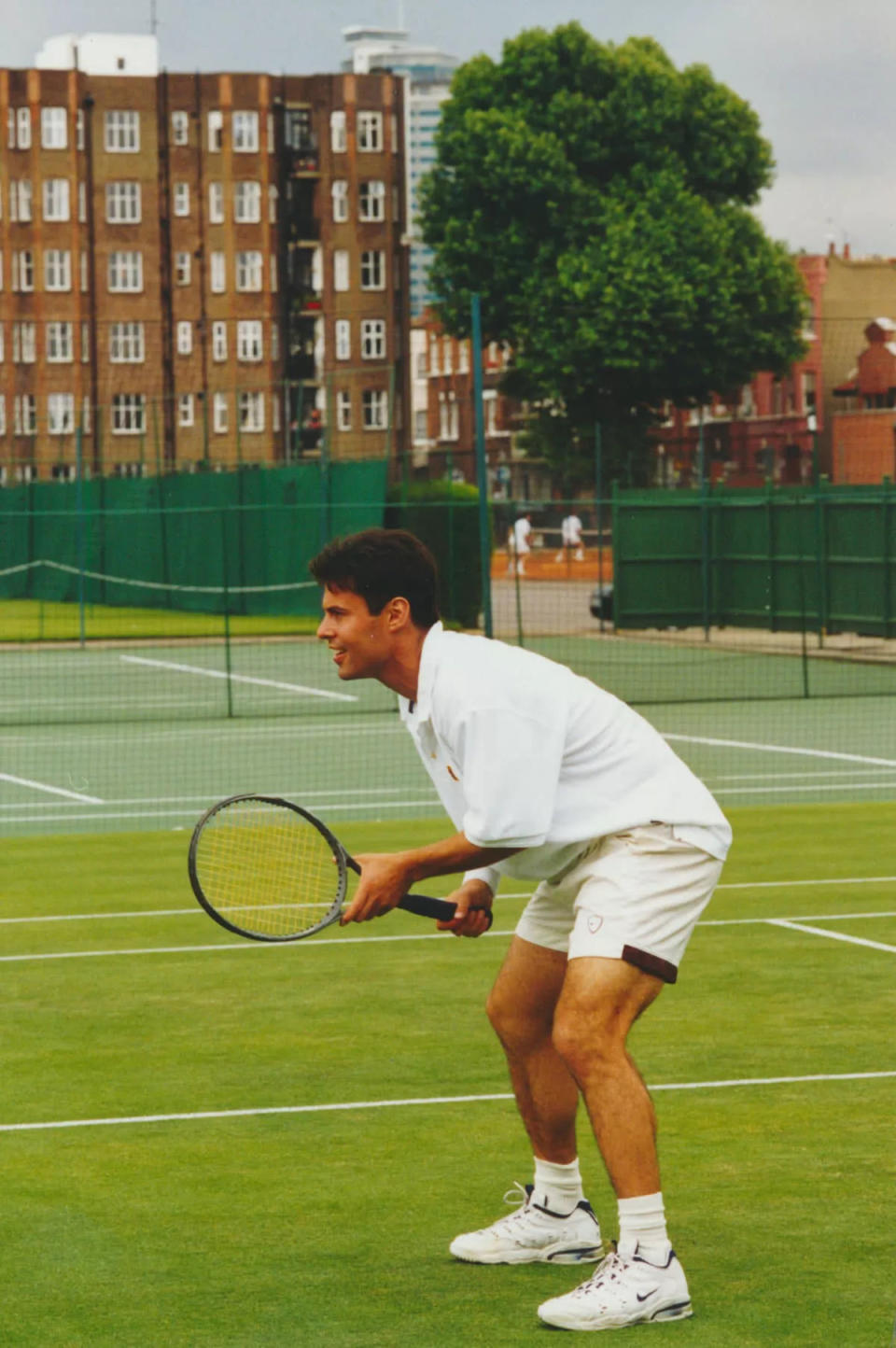 A young Josh Frydenberg playing tennis