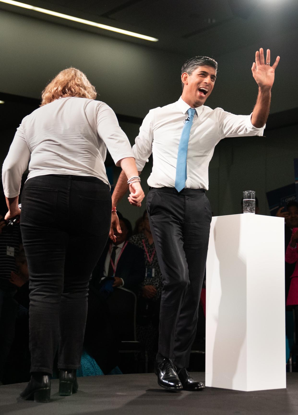 Smile and wave - Prime Minister took to the stage at the Tory Conference in Manchester (Stefan Rousseau/PA Wire)