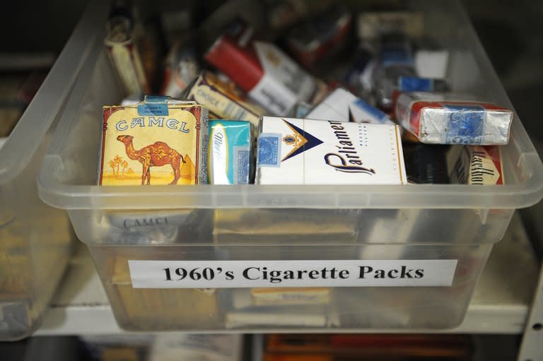 Cigarette packages from the 1960's are seen at the History For Hire prop house in North Hollywood, California, August 9, 2013. A ship's wheel here, a suitcase there -- Pam Elyea walks briskly through the aisles of her cavernous warehouse pointing at antiques she has rented out as props for Hollywood movies