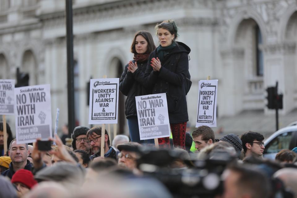 LONDON, UNITED KINGDOM - JANUARY 04 : People take part in an anti-war rally following the killing of Iranian Revolutionary Guards' Quds Force commander Qasem Soleimani by a US airstrike in the Iraqi capital Baghdad, on January 04, 2020 at Downing Street in London, United Kingdom. (Photo by Ilyas Tayfun Salci/Anadolu Agency via Getty Images)