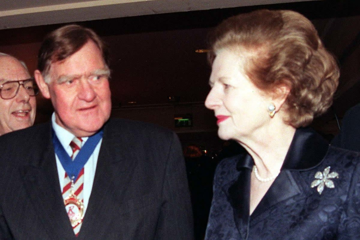 Sir Bernard Ingham, pictured with Baroness Thatcher in 1998, has died at the age of 90  (PA)