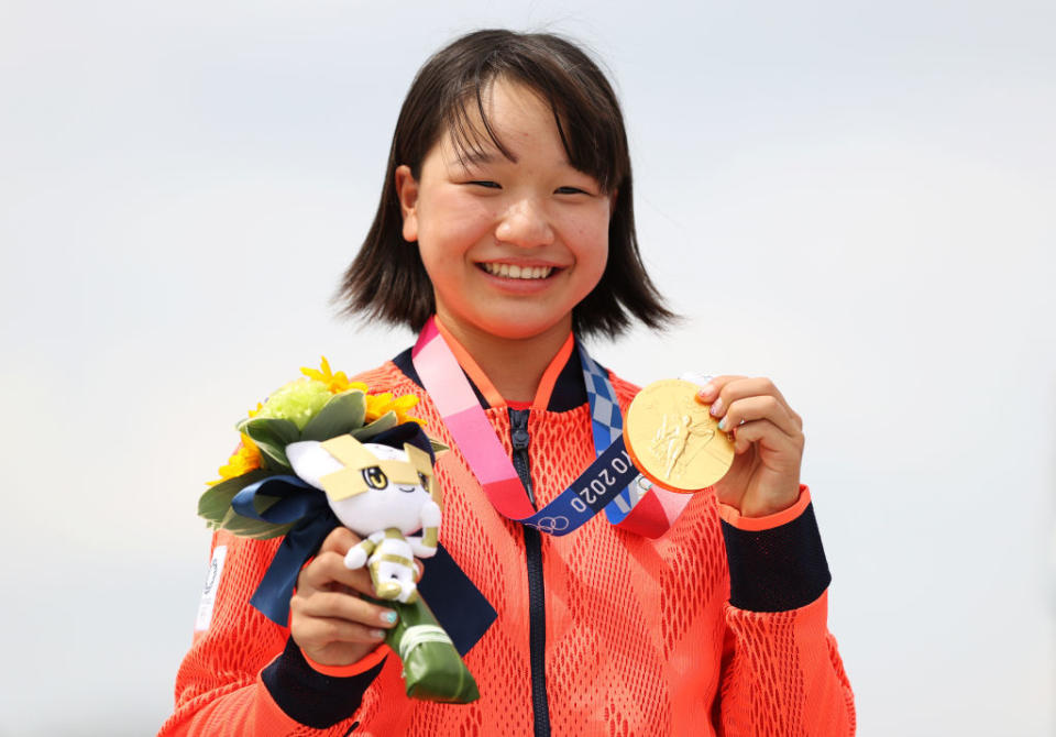 Momiji Nishiya of Team Japan poses with her gold medal during the Women's Street Final medal ceremony on day three of the Tokyo 2020 Olympic Games at Ariake Urban Sports Park on July 26, 2021 in Tokyo, Japan.<span class="copyright">Patrick Smith—Getty Images</span>