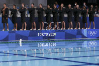 <p>Team United States players line up for the national anthems during the Men’s Classification 5th-6th match between Croatia and the United States on day sixteen of the Tokyo 2020 Olympic Games at Tatsumi Water Polo Centre on August 08, 2021 in Tokyo, Japan. (Photo by Tom Pennington/Getty Images)</p> 
