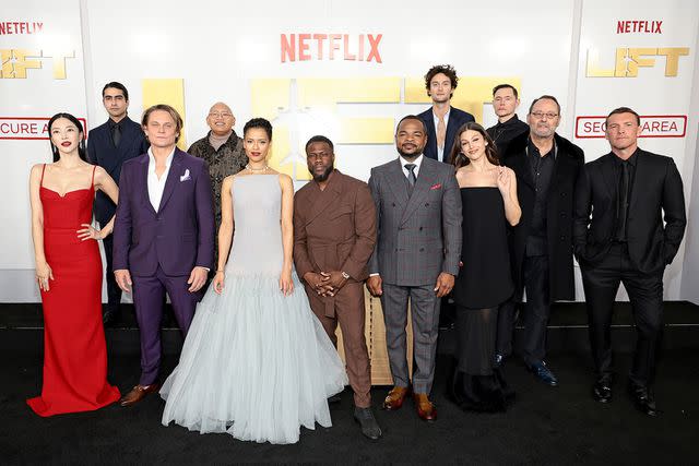 <p>Dimitrios Kambouris/Getty Images</p> Kevin Hart with the cast of "Lift"