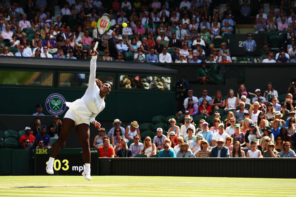 Serena Williams serves at Wimbledon in 2018.