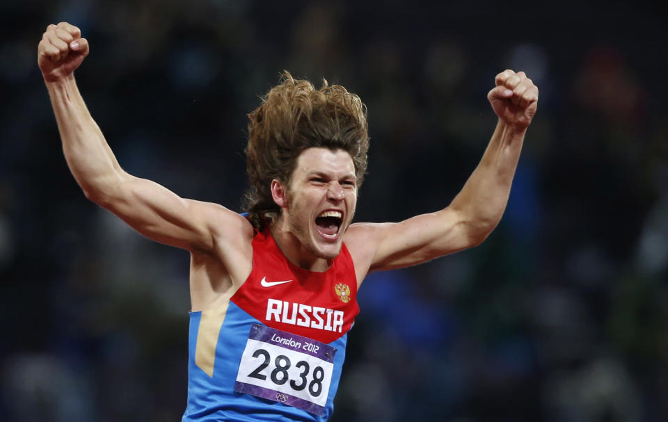 Russia's Ivan Ukhov reacts after winning the men's high jump final during the London 2012 Olympic Games at the Olympic Stadium August 7, 2012. REUTERS/Mark Blinch (BRITAIN - Tags: OLYMPICS SPORT ATHLETICS TPX IMAGES OF THE DAY)