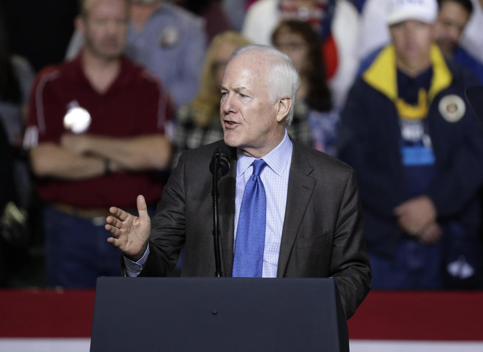 FILE - In this Feb. 11, 2019, file photo, Sen. John Cornyn, R-Texas, address a crowd at a rally for President Donald Trump at the El Paso County Coliseum in El Paso, Texas. Democrat MJ Hegar of Texas says she's running for U.S. Senate in 2020 against Republican incumbent Cornyn. (AP Photo/Eric Gay, File)