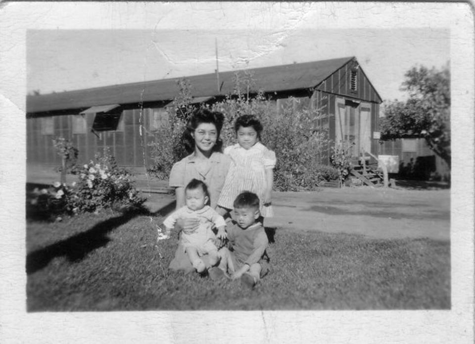 Hanako Wakatsuki's grandmother Chizuye and her children Patty, Geroge and Woody at Manzanar.