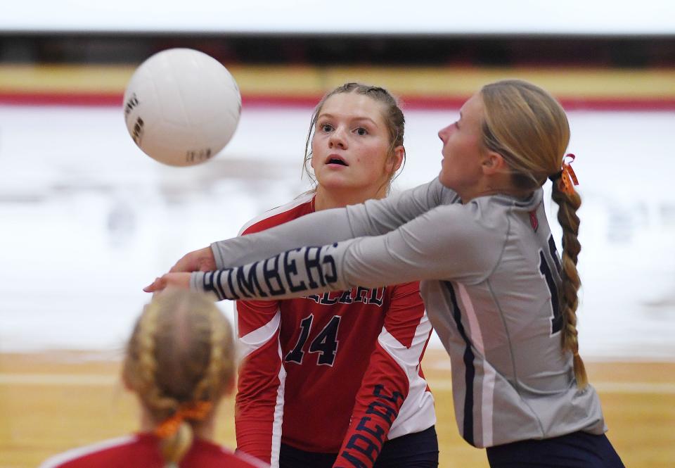 Ballard's Payton Askelsen (19) returns the ball against Carroll during the second set of the Bombers' five-set loss at the Ballard High School gym on Tuesday, Sept. 20, 2022, in Huxley, Iowa.