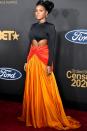 <p>Who: Janelle Monáe </p><p>When: February 22, 2020</p><p>Wearing: Balmain</p><p>Why: We’re used to seeing Janelle Monáe in monochromatic black-and-white, but she boldly took on color at the NAACP Awards and we want <em>more</em>. From the daring cutouts to the skirt's sunrise color combo, she wins best dressed of the week. </p>