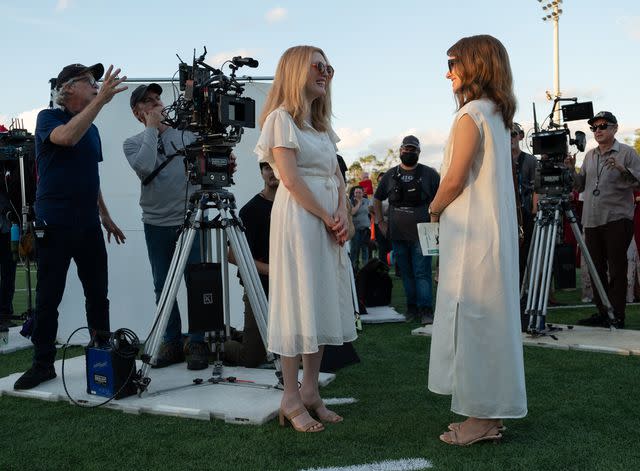 <p>Francois Duhamel/Courtesy of Netflix</p> Julianne Moore and Natalie Portman behind the scenes in May December