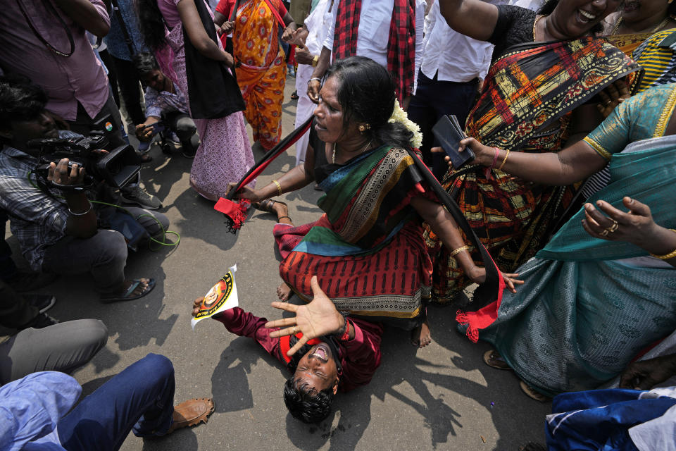 Dravida Munnetra Kazhagam (DMK) party supporters celebrate as they follow proceedings of the vote counting at their party headquarters in Chennai, India, Tuesday, June 4, 2024. India began counting more than 640 million votes Tuesday in the world’s largest democratic exercise, which was widely expected to return Prime Minister Narendra Modi to a third term after a decade in power. (AP Photo/Mahesh Kumar A.)