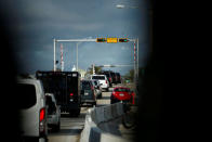 U.S. President Donald Trump's motorcade leaves Mar-a-Lago in Palm Beach, Florida, U.S., November 24, 2017. REUTERS/Eric Thayer