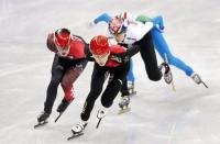 Short Track Speed Skating Events - Pyeongchang 2018 Winter Olympics - Women's 3000 m Final - Gangneung Ice Arena - Gangneung, South Korea - February 20, 2018 - Fan Kexin of China, Kim Boutin of Canada and Shim Sukhee of South Korea compete. REUTERS/John Sibley