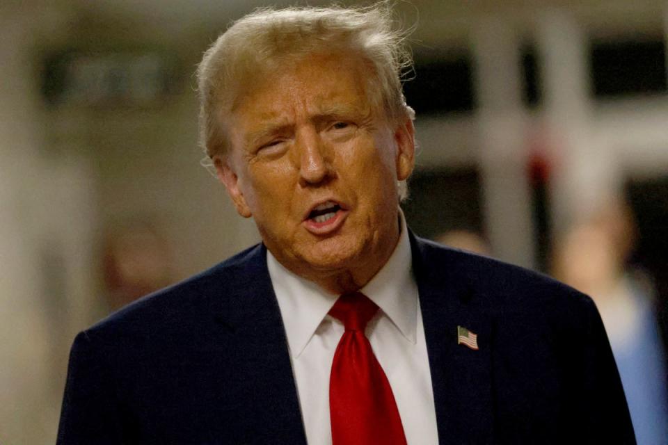 Former President and Republican presidential candidate Donald Trump leaves State Supreme Court in New York, on 25 April 2024 (AP)