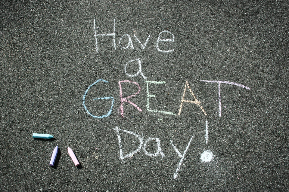 Write encouraging sidewalk messages in chalk near schools.