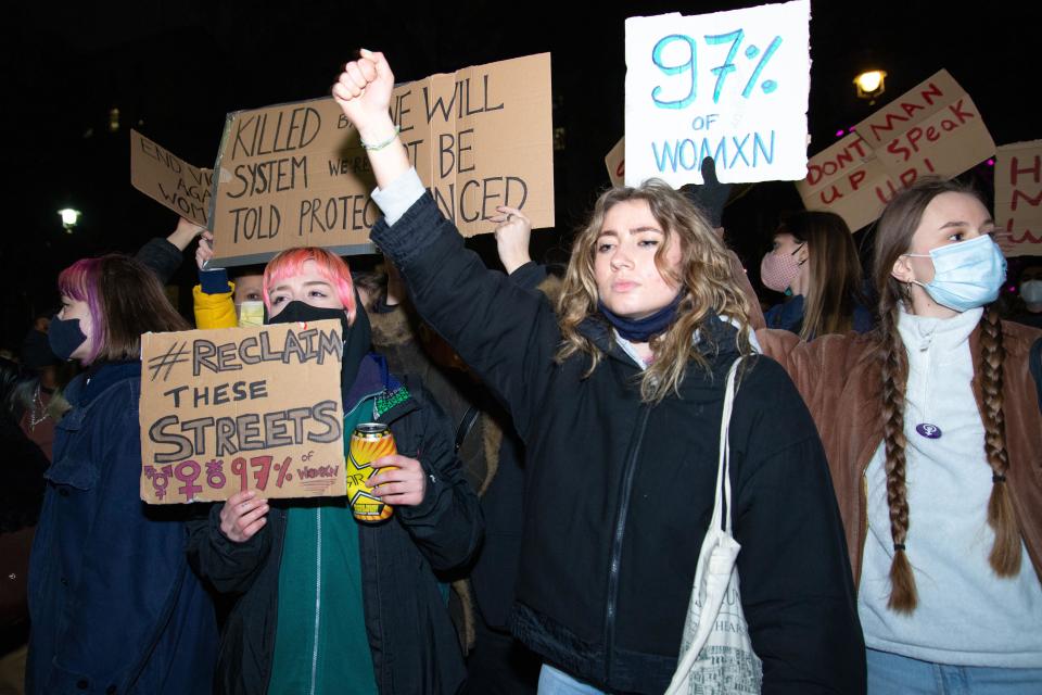 London, UK 14th March 2021 Thousands gather at Scotland Yard and Trafalgar Square followed by marches to Parliament Square, via Downing Street, in protest at the manhandling of women at the Sarah Everard vigil. Many also protested at Home Secretary Priti Patels policing bill which will be discussed in the House of Commons, which will impact on the right to protest. Credit: Denise Laura Baker/Alamy Live News