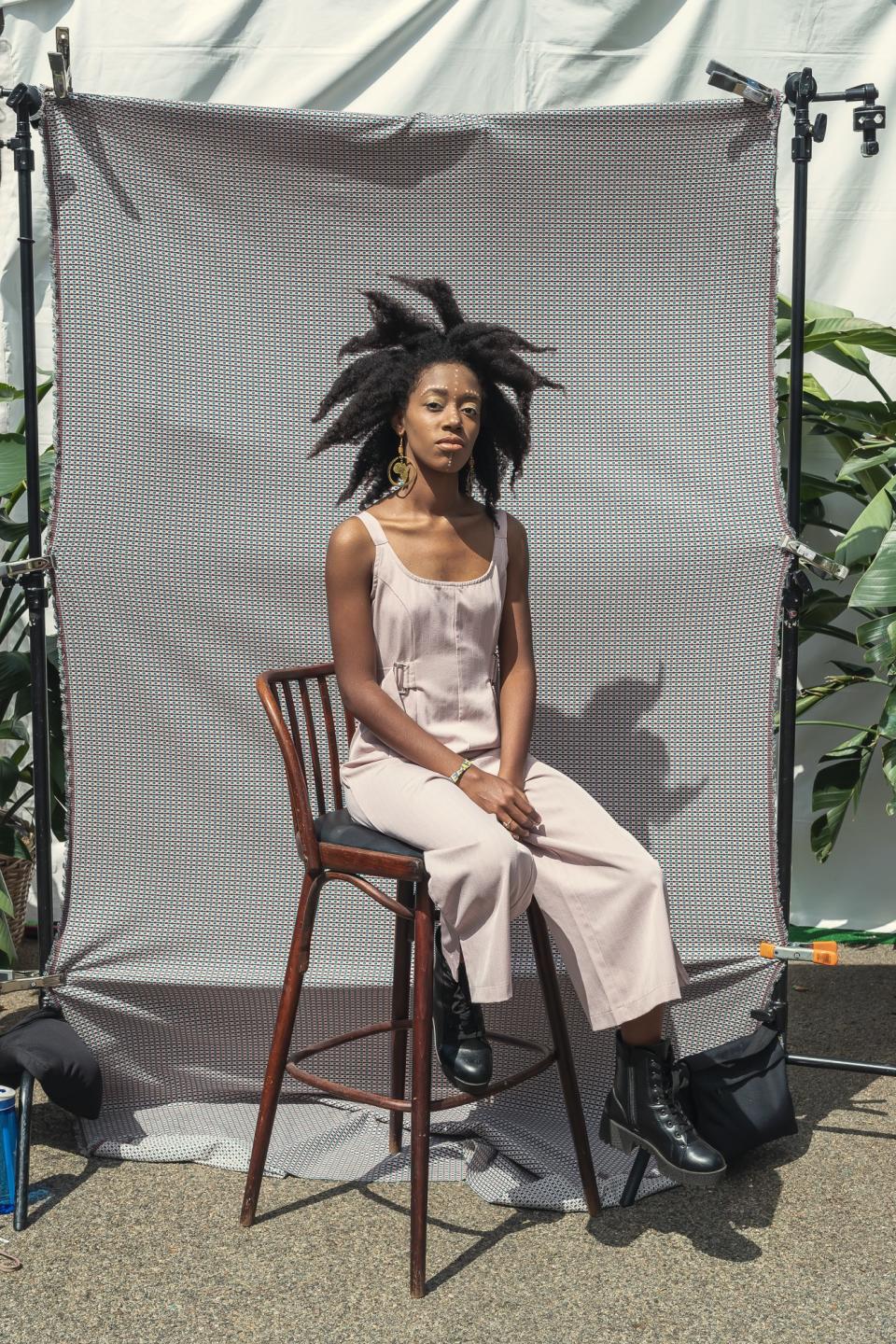 <p><strong>What does punk mean to you?</strong><br> Punk means resistance, it means going up against the system and being able to confidently say "I’m here and you can’t do anything about it".</p> <p><strong>What do you think makes the style here so special at Afropunk?</strong><br> It’s a cool space where people are able to just be themselves in whatever form they choose. Being able to share that with other black people is just a beautiful thing to have.</p> <p><strong>What inspired your look today?</strong><br> With the hair, I wanted it just to be big and to take up space.</p> <p><strong>Finish the sentence, “Black culture is…”</strong><br> Black Culture is everything</p>