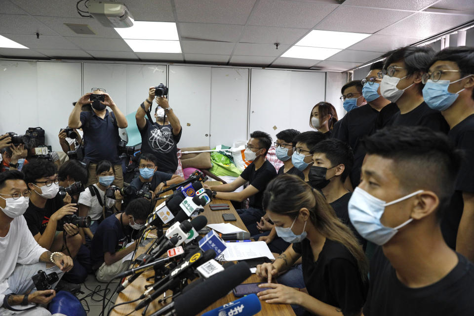 Pro-democracy activists who were elected from unofficial pro-democracy primaries attend a press conference in Hong Kong, Wednesday, July 15, 2020. Young activists and localist candidates dominated Hong Kong's unofficial pro-democracy primaries over the weekend, with hundreds of thousands of people voting despite warnings the election could violate the territory's new security law imposed by Beijing. (AP Photo/Kin Cheung)