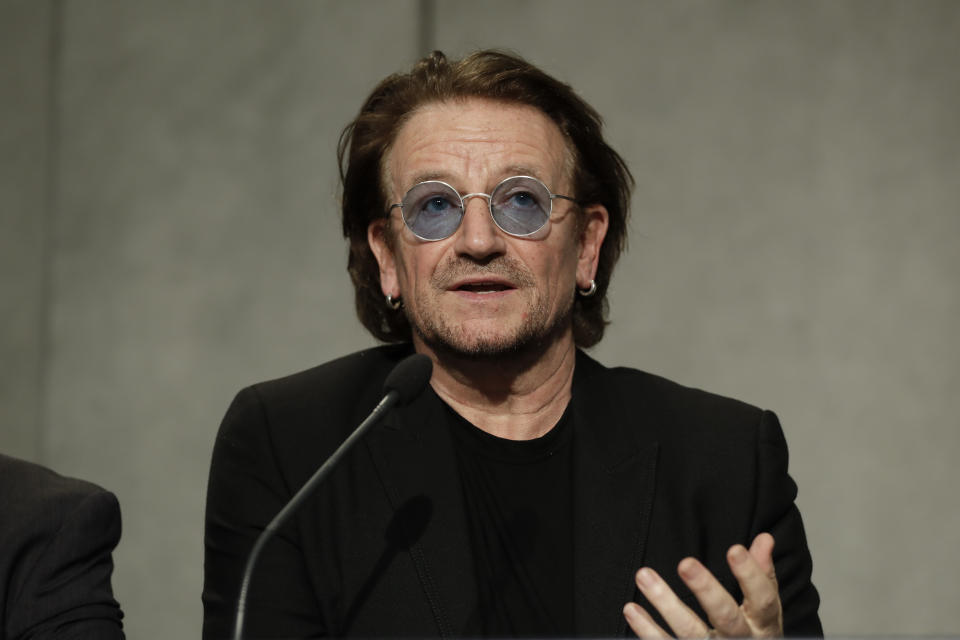 U2 rock band frontman Bono Vox talks to reporters during a press conference he held at the end of a meeting with Pope Francis, at the Vatican, Wednesday, Sept. 19, 2018. (AP Photo/Andrew Medichini)