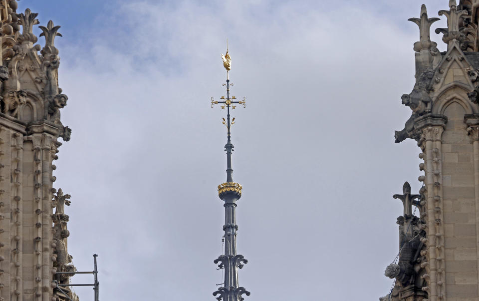 The new golden rooster is seen atop the spire between the two towers of Notre-Dame de Paris cathedral, Feb. 13, 2024, in Paris, France.  / Credit: Getty