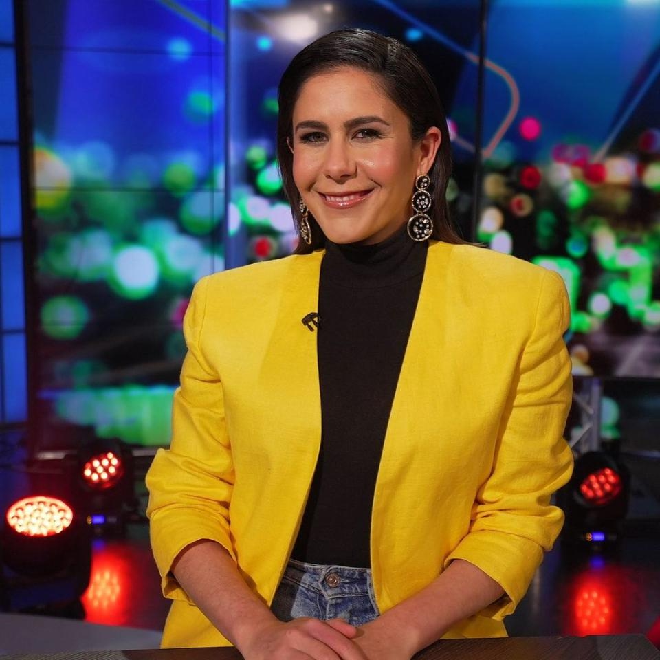 The Project host Jan Fran wearing a yellow jacket on set. Photo: Channel 10.