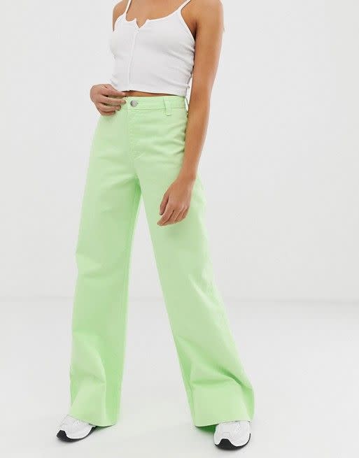 full length wide leg jeans in neon pastel green with deep hem detail
