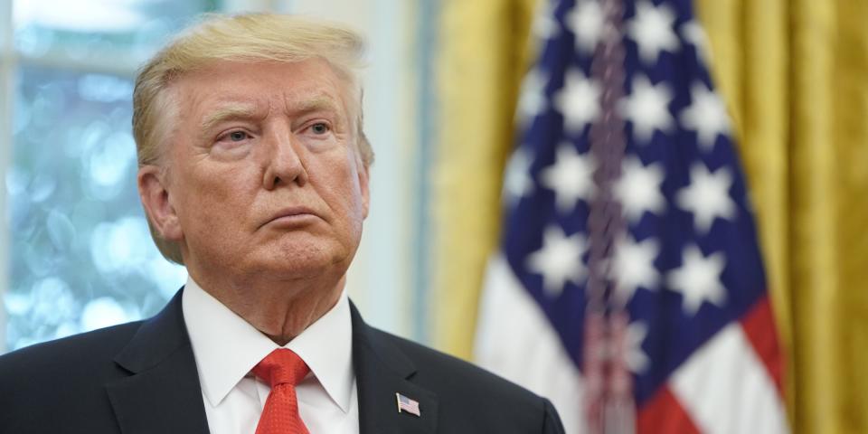 FILE PHOTO: U.S. President Donald Trump stands in the Oval Office during a presentation of the Presidential Medal of Freedom to NBA Hall of Famer Jerry West at the White House in Washington, U.S., September 5, 2019. REUTERS/Joshua Roberts