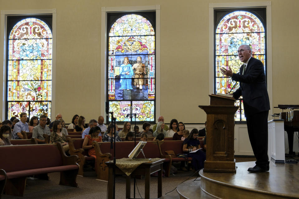 Bart Barber, pastor for the First Baptist Church of Farmersville, Texas, and new president of the Southern Baptist Convention, prays over his congregation on Sunday, Sept. 25, 2022. The SBC faces multiple challenges. Rank-and-file Baptists have demonstrated a strong commitment to implementing sex abuse reforms, but the final outcome remains unclear. The denomination also has a problem with falling membership (AP Photo/Audrey Jackson)