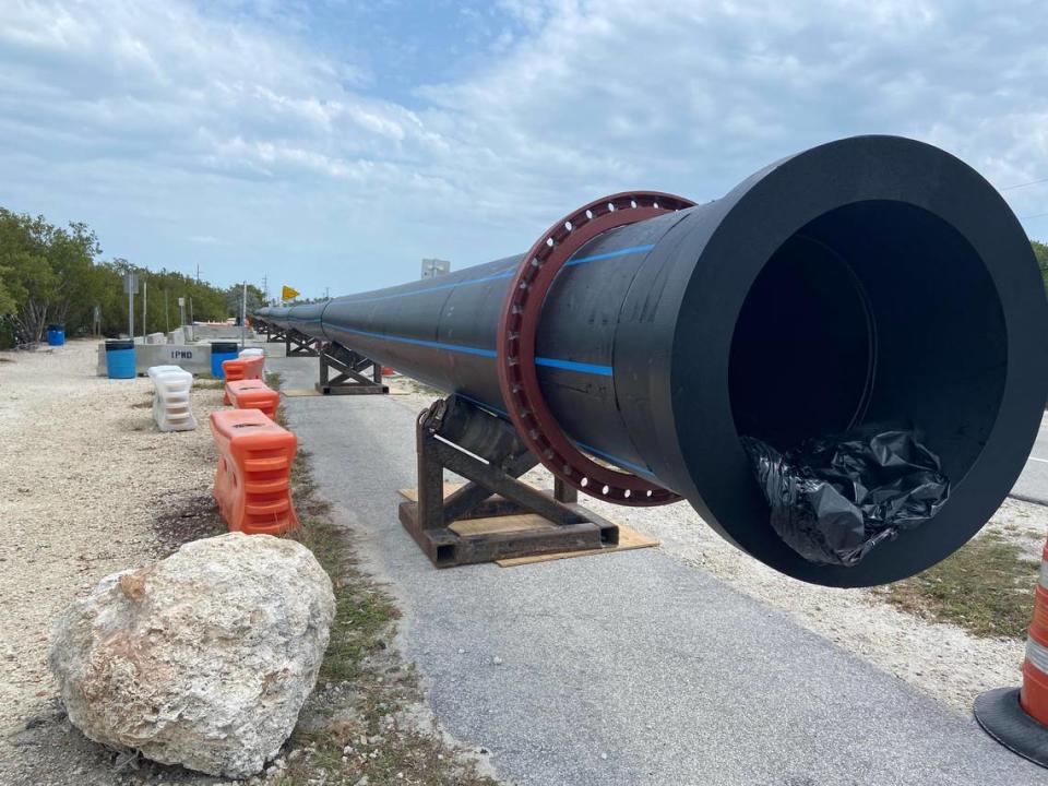Water pipes are propped up on the side of U.S. 1 at mile marker 79 in the Florida Keys Tuesday, March 14, 2023. The pipes are part of a $42-million project to replace aging infrastructure in the Upper Keys.
