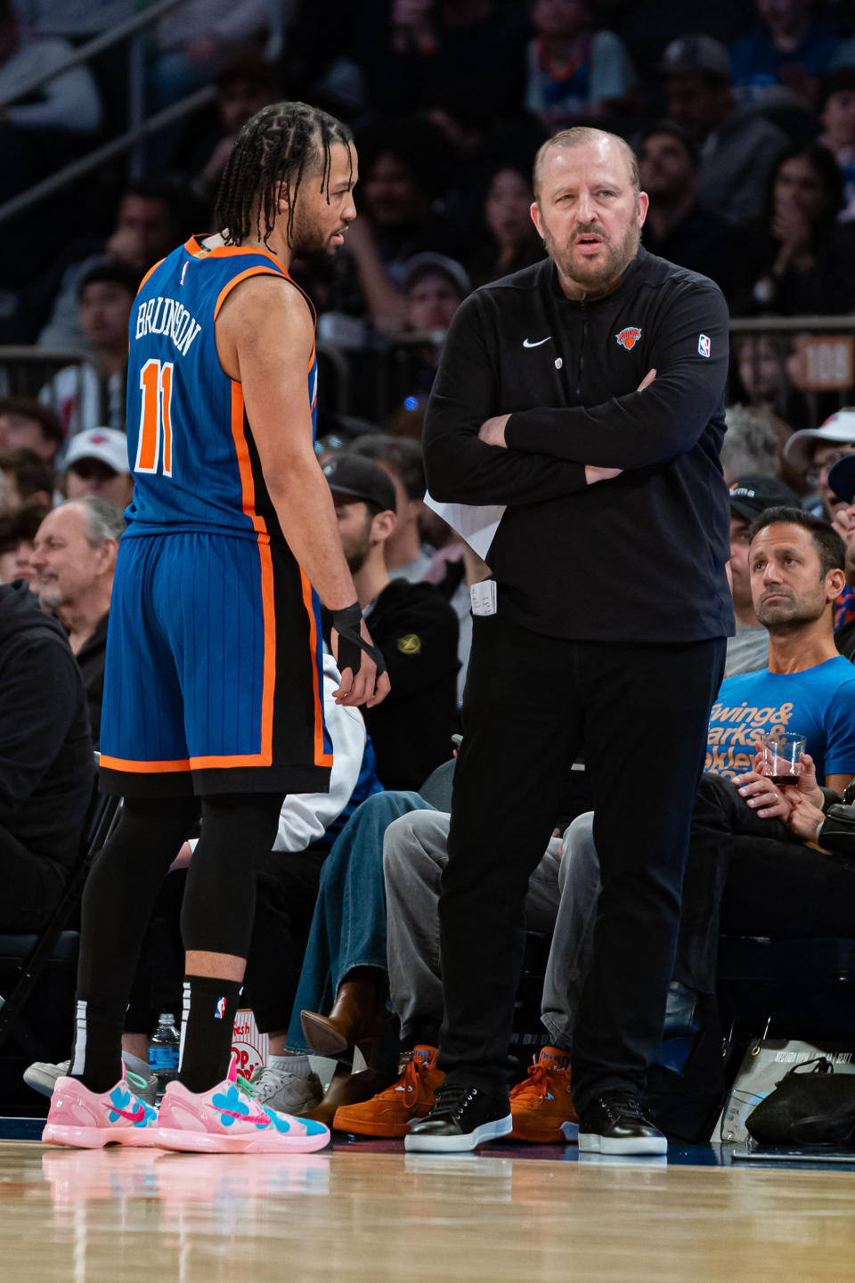 New York Knicks head coach Tom Thibodeau, right speaks with New York Knicks' Jalen Brunson (11) during the second half of an NBA basketball game against the Oklahoma City Thunder in New York, Sunday, March 31, 2024. (AP Photo/Peter K. Afriyie)