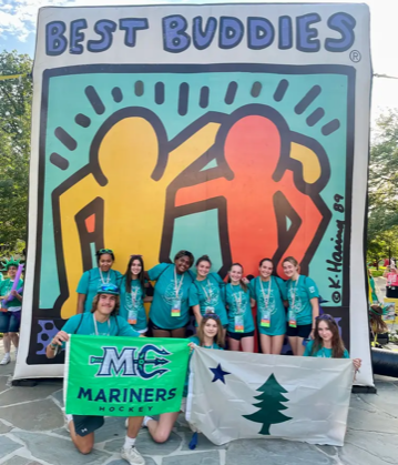 Wells High School senior Wilson Clough is holding the Mariners flag and is posing with the group from Maine that attended the Best Buddies Leadership Conference at Indiana University in July. Best Buddies is the inspiration for his Eagle Scout project.