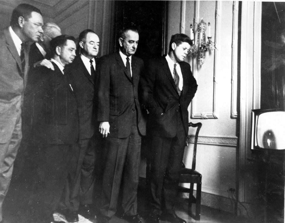 <p>U.S. President John F. Kennedy, right, and Democratic congressional leaders watch the Atlas rocket and the newly-manned Mercury spacecraft blast off at Cape Canaveral, Fla., on a television set in the White House in Washington, D.C., on Feb. 20, 1962. The spacecraft called Friendship 7 carries Col. John Glenn, Jr. as the first American to orbit the earth. From left are, Rep. Hale Boggs, La.; House Speaker John McCormack, Mass., partially hidden; Rep. Carl Albert, Okla.; Sen. Hubert Humphrey, Minn.; Vice President Lyndon Johnson and Kennedy. (AP Photo)</p>