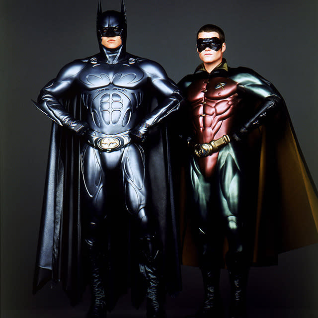 Long before Christopher Nolan left his mark on the Batman franchise with the hugely successful <em>Dark Knight</em> trilogy, there was the 1989 film series first directed by Tim Burton and later taken over by Joel Schumacher. These four films -- <em>Batman</em>, <em>Batman Returns</em>, <em>Batman Forever</em>, and <em>Batman & Robin -- </em>featured a largely gothic and camp version of the caped crusader, which was a reflection of the comic book movies at the time. Each film topped the last, with <em>Forever -- </em>released 20 years ago on June 16, 1995 -- collecting $350 million at the box office, earning three Academy Award nominations, and making international stars out of Val Kilmer and Chris O’Donnell, Batman and Robin respectively. The film also featured Nicole Kidman, Drew Barrymore, and Jim Carrey at crossroads in their careers and the already popular Tommy Lee Jones. <strong>WATCH: A Look Back at Batman on Film Through the Years</strong> But the franchise came to a screeching halt after the fourth film starring George Clooney was met with dismal reviews in large part to its extremely campy approach. Batman, and subsequent Robin films, was no more. Ahead of <em>Forever</em>’s 20th anniversary in theaters, O’Donnell talked to ETonline about what it meant to play Robin at the time, working with both Kilmer and Clooney, and what went wrong with the franchise. <strong>ETonline: What did the film mean to you at the time? You were only 25 when you first got involved in the franchise. </strong> <strong>Chris O’Donnell: </strong>It was interesting. I remember sitting in the back of a limousine being driven somewhere and my agent asking, “Are you going to do this or not?” I remember thinking, “My god, it seemed like a no-brainer. I grew up watching Batman and how could you not? But at the same time, I knew what a huge thing it was. Do I want to be a part of this? Do I want to be known as Robin?” I remember sitting in the car and going, “What am I going to do?" And I was like, “I’m in. I’m going to do it!” I had a great time working with Joel [Schumacher]. The cast was amazing. The spectacle of the whole thing -- these sets, the money they spent to build it -- I had never seen anything like it in my life. To be the kid who had all the toys growing up and played Batman and Robin as a kid to now get to drive the Batmobile and run around in these costumes, it was a joke. I couldn’t believe they were paying me. <strong>Speaking of driving the Batmobile, that scene featured a cameo by En Vogue. Did you know who the group was at the time? </strong> No, I had no idea. I mean, I knew the name but I had no idea really. <strong>You mentioned the great cast. The film featured a lot of great actors at different points in their careers, but all largely on the way up. </strong> It was great. I had just worked with Drew [Barrymore] on <em>Mad Love</em> so I was real friendly with her. Nicole was terrific. I didn’t know her really well because she was married to Tom [Cruise] at the time and they were just kind of in their own world. Jim Carrey had most of his scenes with Tommy Lee, who I had worked with before so I knew him. I had most of my stuff with Val [Kilmer] and Val is an incredible actor. He can be a strange guy and not always a friendly guy, but a terrific actor -- and I thought he was great as Batman. If I’m going to hang with the Batman, I’m probably going to hang with George [Clooney, who took over the role in <em>Batman & Robin</em>]. Warner Bros. <strong>Of course, <em>Forever</em> and the sequel got a lot of attention at the time for the costumes. </strong> Especially the second one! My god, I look at some of the photos now. Joel was really having his way, knowing how he wanted these costumes done. <strong>What was it like to wear the suit? </strong> For me, I had to wear that little mask that was glued. First thing in the morning they painted my eyes black and then would glue the mask on [to my face]. It was so hot, you would touch the mask and water would just run down your face. During the first one, we didn’t get in and out of costumes a lot because it was too complicated. But the second, we had a whole system set up. I had two people full time that just got me in and out of my suit. And if it was going to be more than a little while between takes I got out of my suit and got a fresh under suit. That was the biggest challenge to be honest with you. <strong>You mentioned to Conan O’Brien that you still have it in a crate somewhere. </strong> I do! It’s down in the basement. <strong>Is that like a museum piece now? </strong> No. It’s in a wood crate. Honestly, my kids have never seen it. They’re like, “When are you going to open that thing?” And I go, “When I find a screwdriver.” It may have decomposed in there for all I know. <strong><em>Forever</em> and the sequel get a bad rap. Joel even apologized at one point. Even though it’s campy, <em>Forever</em> is a fun film. </strong> I thought <em>Forever</em> was terrific. I really thought it was well made. With <em>B</em> <em>atman & Robin</em>, I think Warner Bros. got piggy. It was too soon. If I remember correctly, it wasn’t too far after <em>The Fugitive</em> came out. And if I remember correctly, <em>The Fugitive</em> was kind of a mess when they were making it but they figured it out and it was a huge hit. And I think for a while, Warner Bros. was like, “It doesn’t matter. We can throw enough money at it and it’ll be a huge hit.” There needs to be a certain amount of time before people had the appetite, “I need another <em>Batman</em>.” We had just finished and all of a sudden it was, like, boom here’s another one. There was a lot of waste. I felt it wasn’t tight and it wasn’t thought out. People just got greedy. That being said, I had a great time doing it. Warner Bros. <strong>You previously revealed that there was going to be a spin-off for Robin, but that didn’t end up happening. </strong> Yeah there was at one point: <em>Nightwing</em>. When the reviews came out on <em>Batman & Robin,</em> that was shut down immediately. This has been a great opportunity for me and I’m not going to look a gift horse in the mouth. It was an amazing opportunity and gave me incredible international exposure. And everyone dealt with it differently. Some people became very reclusive about it and freaked out by it. I thought George handled it great. He was like, “Well, we killed the franchise,” and funny about it. For me, I will always look back with fond memories. But of course, I’m not as proud of the second one as I was of the first one. <strong>Do you have a favorite memory from making the movie? </strong> I was making <em>Mad Love</em> and I flew down from Seattle to Burbank. They had an entire warehouse for the costumes and these artisans from England had come in. They put me in body molds. The artistry of making these suits -- just watching the whole process was just amazing. <strong>Have your children seen <em>Batman Forever</em> or your other films? </strong> They’ve seen the Batman films and <em>The</em> <em>Three Musketeers</em>. The majority of films I’ve been in they’ve never seen. It’s actually kind of fun -- I’m lying on the couch with them, flipping channels and I’ll see a movie I’ve been in they’ve never seen and I’ll just leave it on. They’re like, “Dad seriously what is this? Why are we watching this?!” And then they’ll see me and go, “Is that you?!” They start to watch it and I explain it to them. My oldest daughter has seen a couple of films, but they’ve never seen <em> Scent of a Woman</em> or any of that stuff.