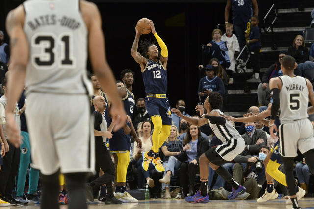 Morant dunks over 7-footer, scores 52 as Grizzlies top Spurs