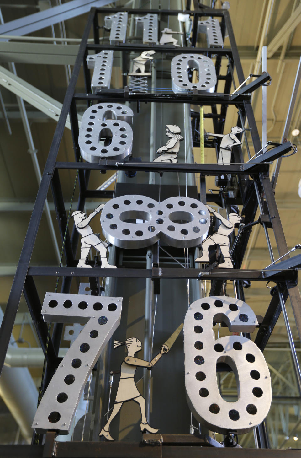 An exhibit called the Tinkerer's Clock is shown at the Exploratorium, an interactive science and activities museum, during a preview in San Francisco, Tuesday, April 9, 2013. The new $300 million museum is set to open April 17 at its new location along the bay with more space and new exhibits. The 330,000-square-foot museum at Pier 15 along the Embarcadero has three times more space than the previous location at the Palace of Fine Arts in the city's Marina neighborhood. (AP Photo/Eric Risberg)