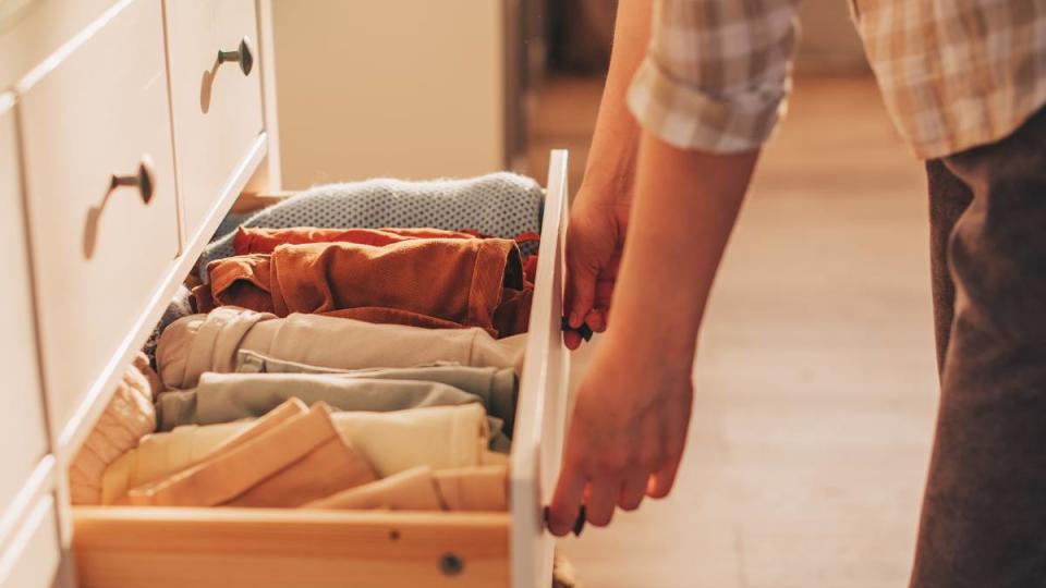 Uses for clear nail polish: chest of drawers with hand clothes