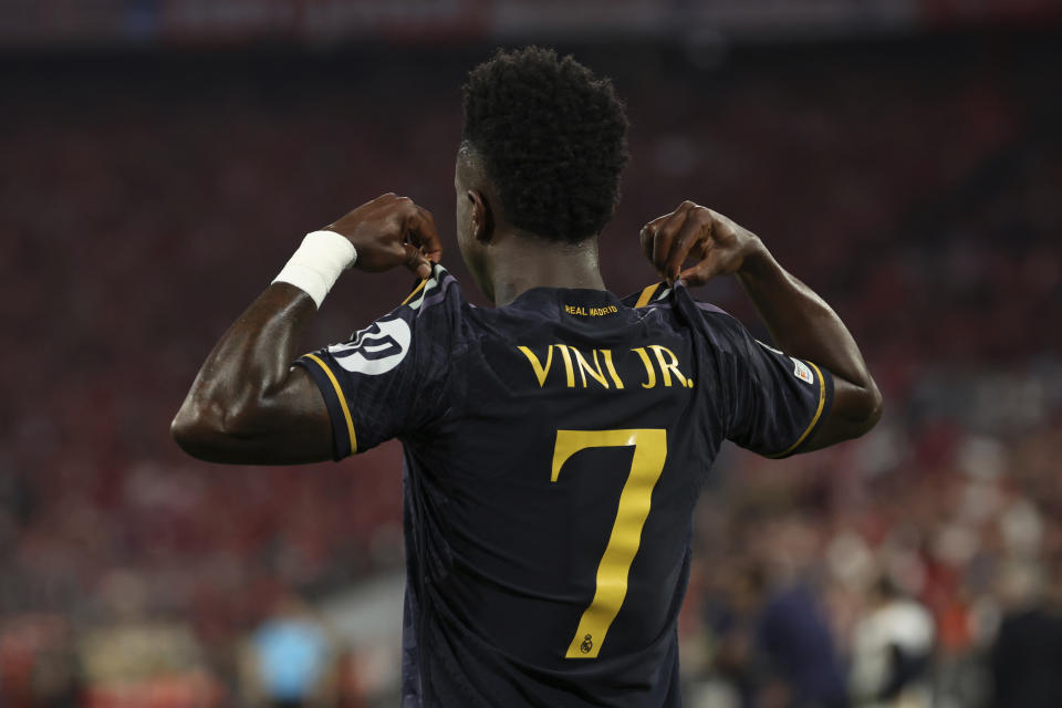 Madrid's Vinicius Junior celebrates after scoring his side's second goal by a penalty during the Champions League, semifinal first leg, soccer match between FC Bayern Munich and Real Madrid in Munich, Germany, Tuesday, April 30, 2024. (Matthias Balk/dpa via AP)