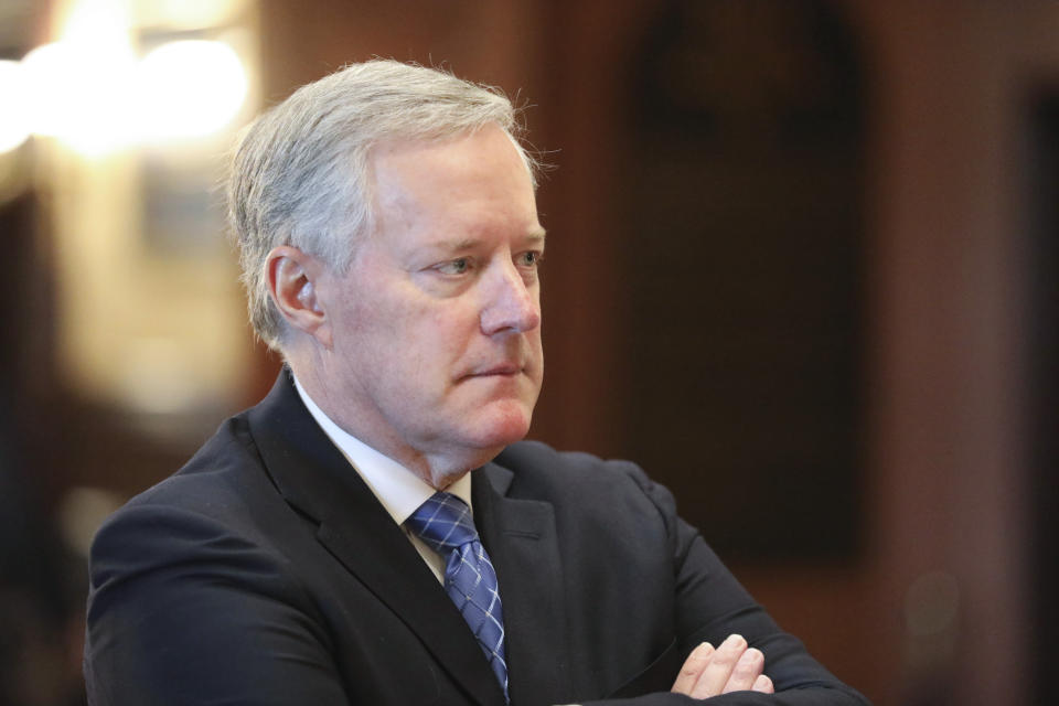 FILE - Former White House Chief of Staff Mark Meadows listens during an announcement of the creation of a new South Carolina Freedom Caucus based on a similar national group at a news conference on April 20, 2022 in Columbia, S.C. Meadows accused the congressional committee investigating last year's attack on the U.S. Capitol of leaking all of the text messages he provided to the panel in what he says was an effort to vilify him publicly. (AP Photo/Jeffrey Collins, File)