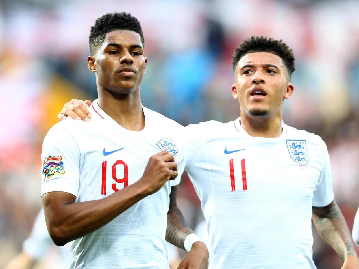 Marcus Rashford (L) and Jadon Sancho together for England: Getty Images