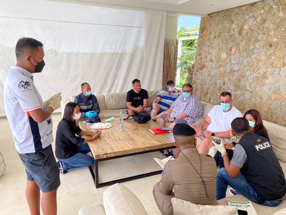 Seen here, police investigators question people at the villa on Koh Samui, where Australian cricketer Shane Warne was staying at the time of his death.