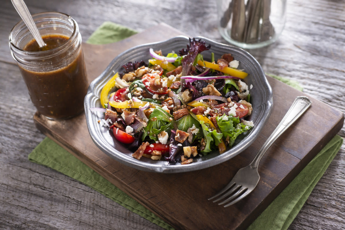 <p>iStock</p><p>This flavorful herbed vinaigrette dressing by Emeril Lagasse tastes wonderful on a dish like a classic Caprese Salad, or it can season a sandwich or top your favorite salad.</p><p><strong>Get the recipe: <a href="/26684/emerillagasse/balsamic-herb-vinaigrette/" data-ylk="slk:Balsamic Herb Vinaigrette;elm:context_link;itc:0;sec:content-canvas" class="link rapid-noclick-resp">Balsamic Herb Vinaigrette</a></strong></p>
