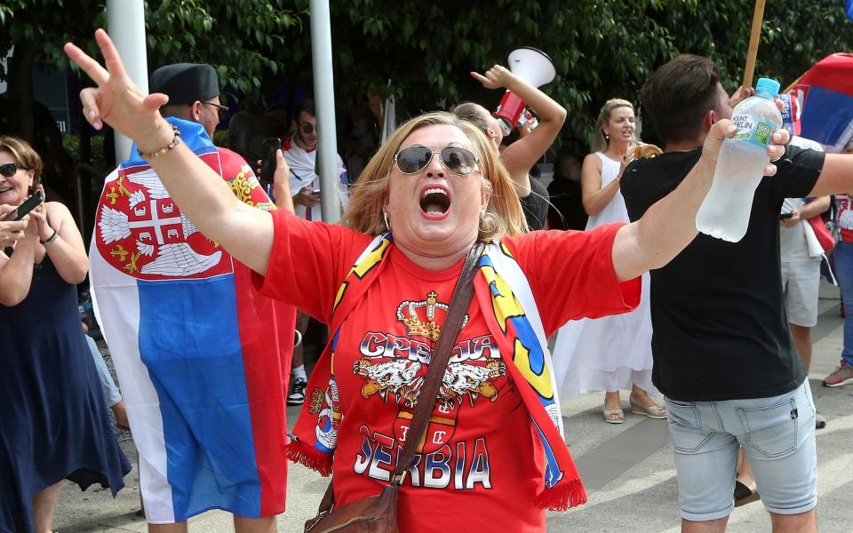 Serbian tennis fans in Melbourne come out in support of Melbourne - AP