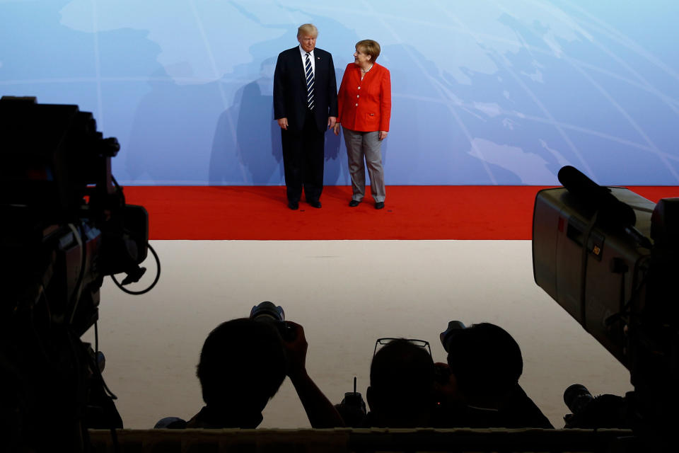 <p>German Chancellor Angela Merkel greets President Donald Trump upon his arrival for the first day of the G20 economic summit on July 7, 2017 in Hamburg, Germany. (Photo: Morris MacMatzen/Getty Images) </p>