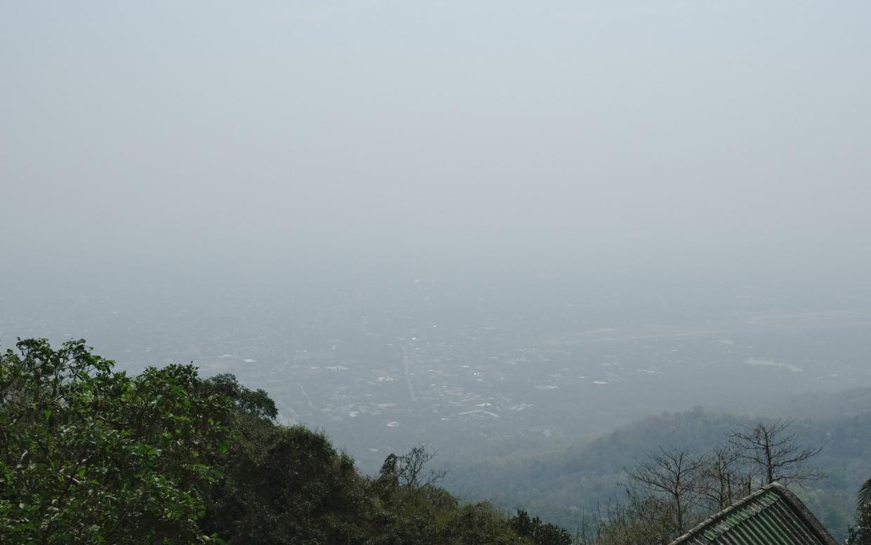 A view of Chiang Mai from Wat Phra That Doi Suthep Ratchaworawihan, disrupted by pollution. According to IQAir, the small city in northern Thailand - which is popular with tourists - has topped the charts for the worldâ€™s worst air quality.