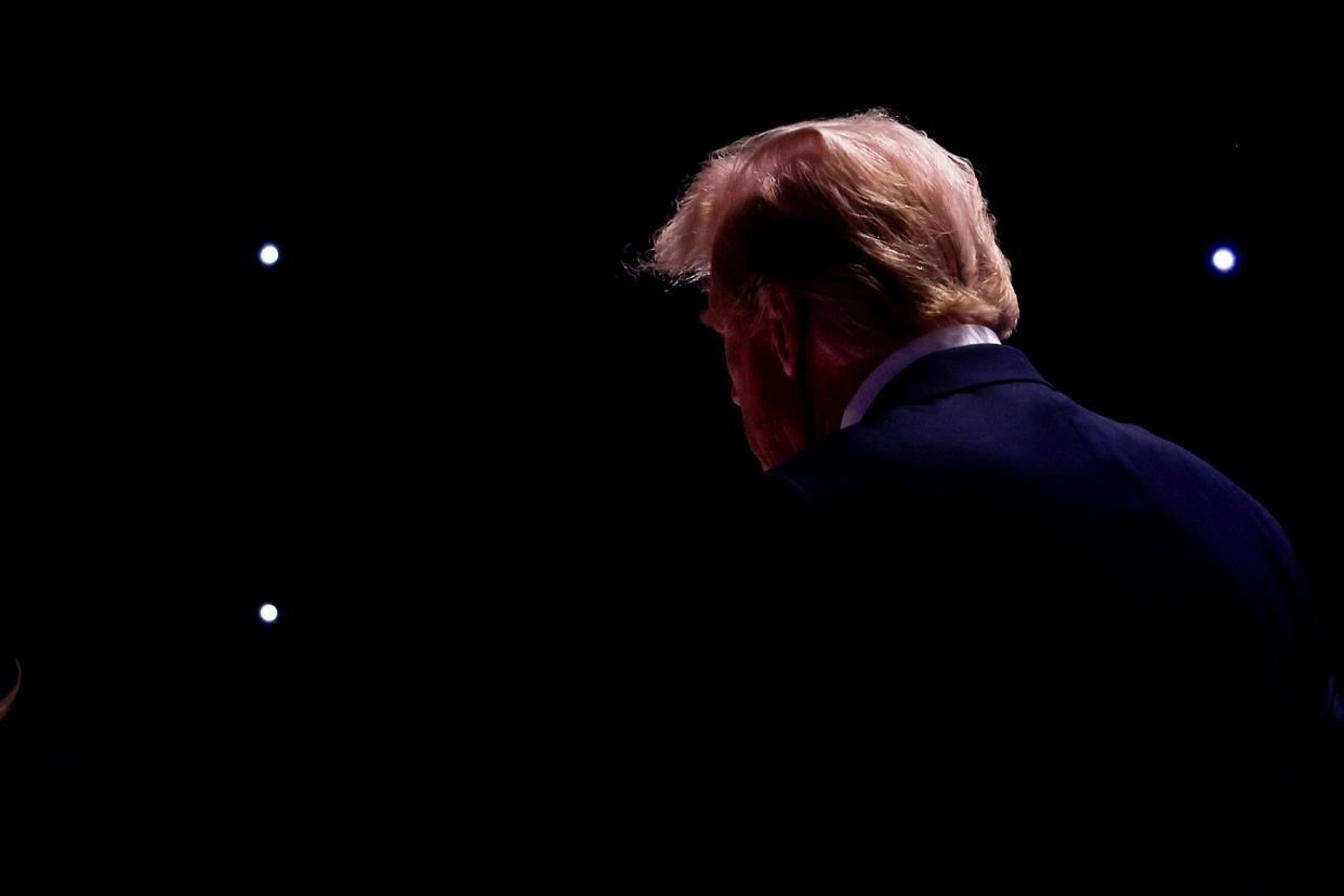 <span>Donald Trump walks off the stage during a break in the debate with Joe Biden in Atlanta on 27 June 2024.</span><span>Photograph: Justin Sullivan/Getty Images</span>
