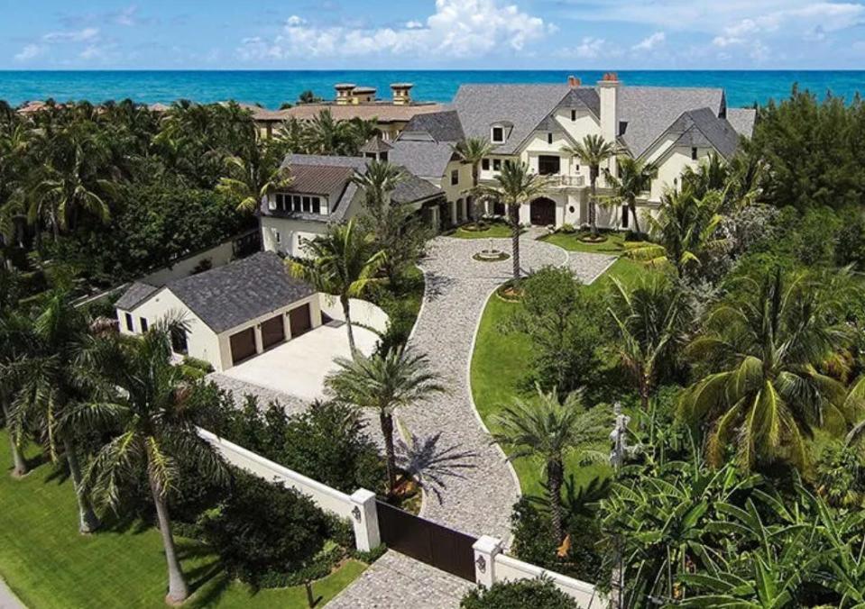 The driveway leads from the front gate to the motor court at 2455 S. Ocean Blvd., a Highland Beach beachfront mansion that just changed hands for a recorded $50 million.