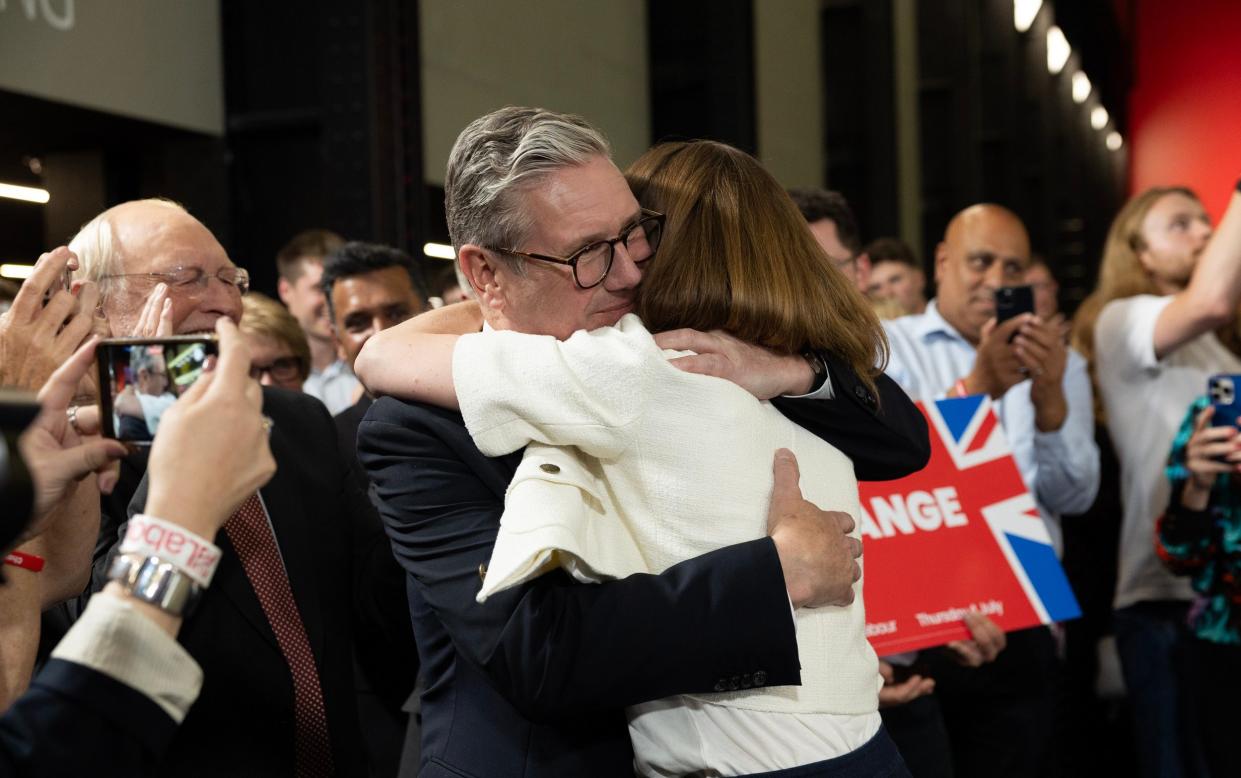 Sir Keir Starmer with his wife Victoria, celebrate with supporters at Labour Party's election watch event